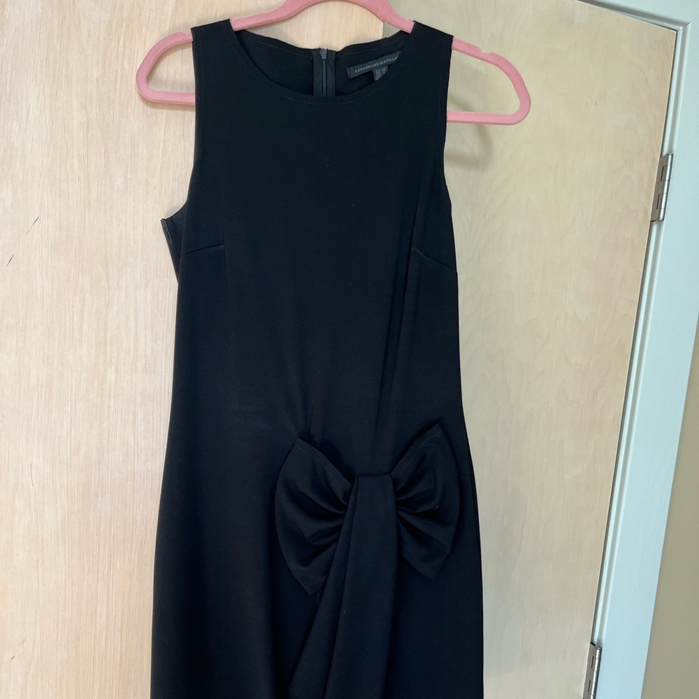 Black cocktail dress with bow
